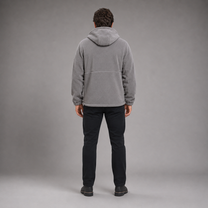 Man wearing gray thermal fleece jacket in full-body rear studio view